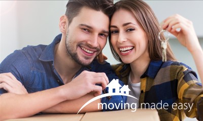 couple with house keys with the Moving Made Easy logo overlaid