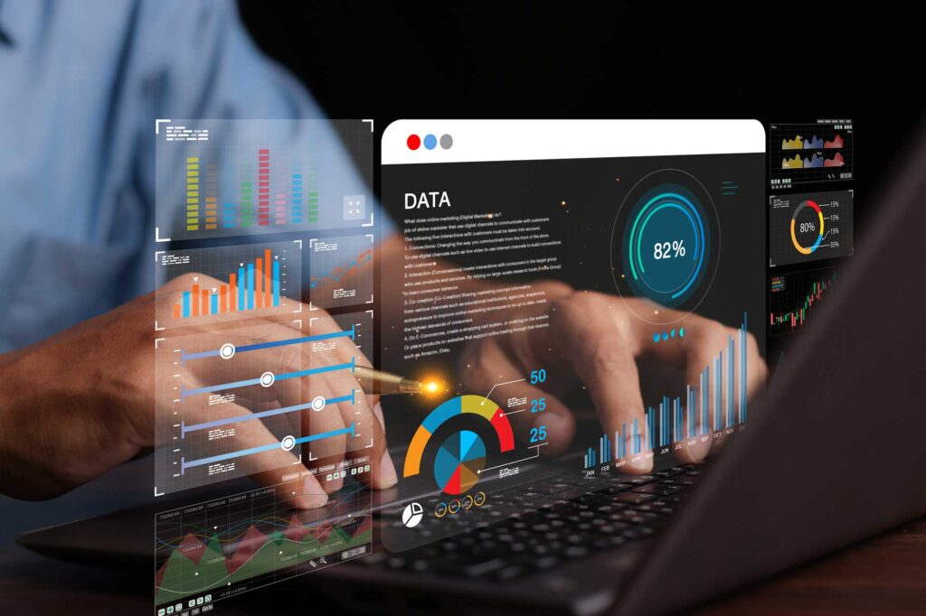 person at a keyboard with screen projected showing data modelling